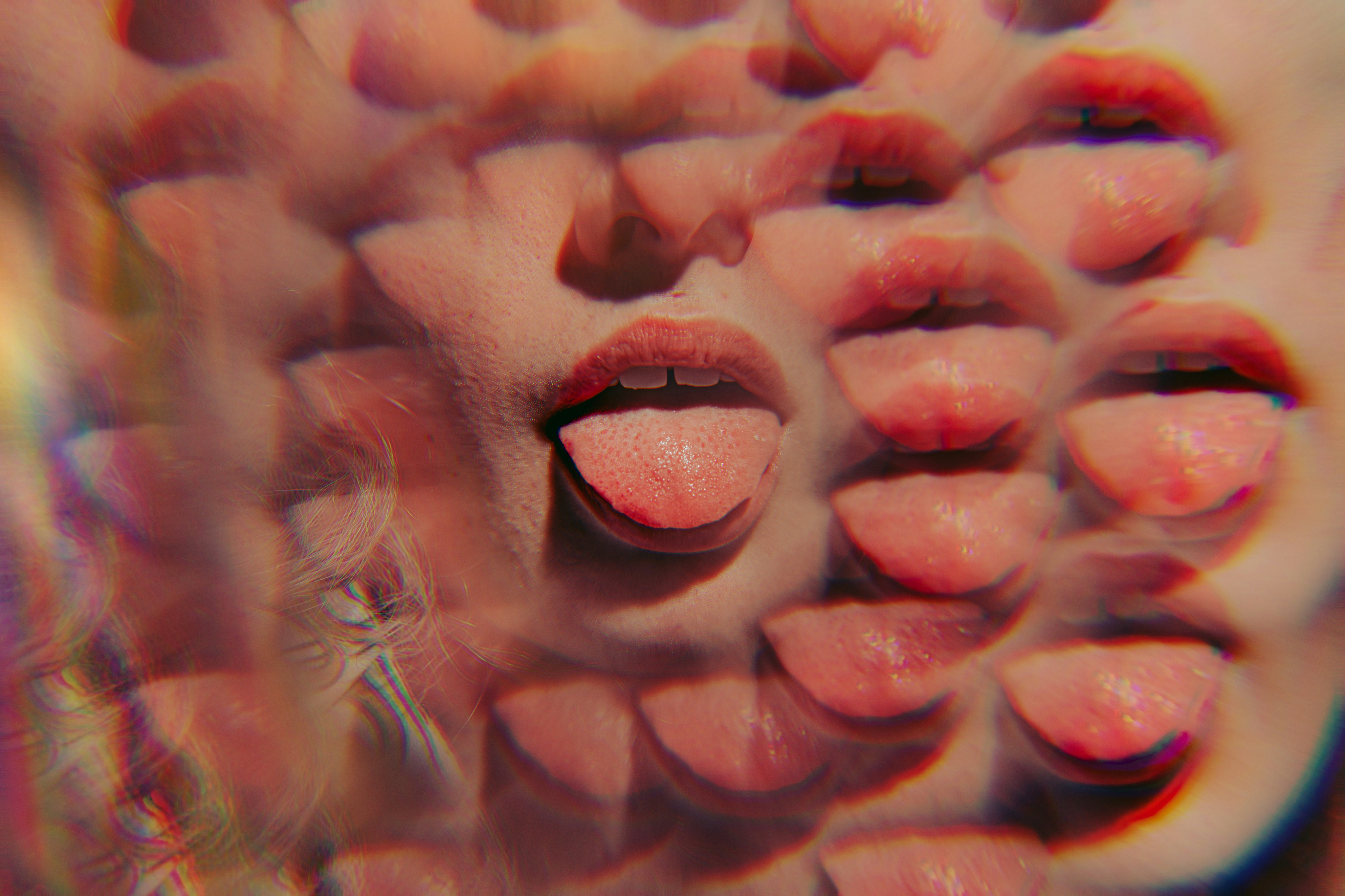 Kaleidoscope of a young woman with her tongue out